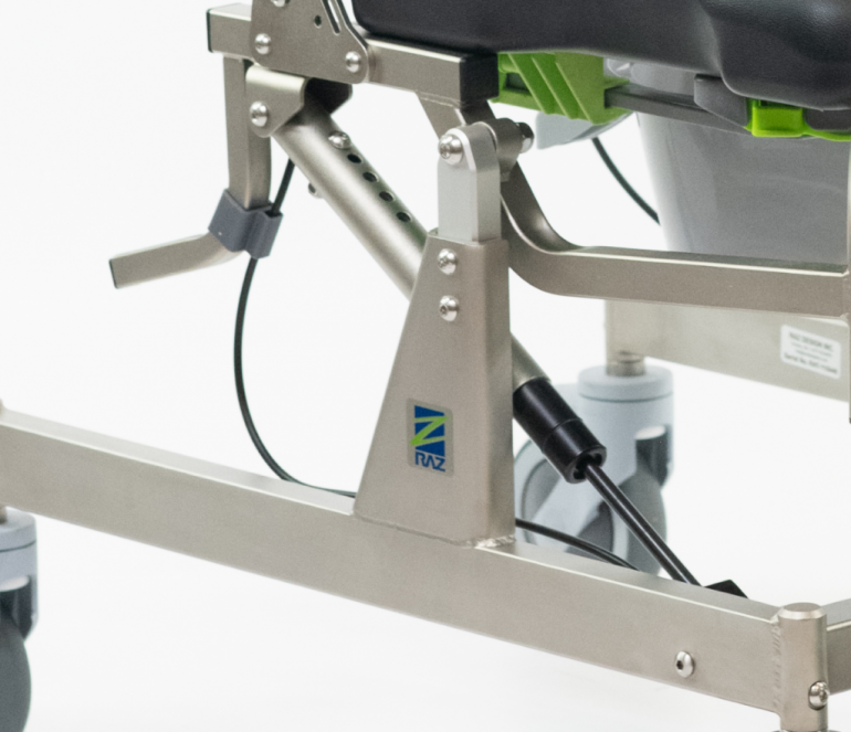 RAZ attendant tilt shower-commode chair
